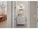 Stylish half bathroom showcasing modern fixtures and patterned floor tiles, conveniently located near the dining area at 1312 Vassar St, Orlando, FL 32804