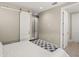 Bedroom featuring modern design with barn door, tiled bathroom and natural light at 1312 Vassar St, Orlando, FL 32804