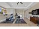 Spacious workout room featuring hardwood floors, ceiling fan, fitness equipment and neutral walls at 1312 Vassar St, Orlando, FL 32804