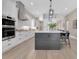 Open concept kitchen with a large island, stainless steel appliances, and ample counter space at 1312 Vassar St, Orlando, FL 32804