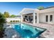 Sparkling pool and covered outdoor area perfect for relaxation and entertaining in a private backyard setting at 1312 Vassar St, Orlando, FL 32804