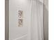 Walk-in shower featuring subway tile surround with decorative tile niches and a white shower curtain at 1312 Vassar St, Orlando, FL 32804