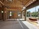 A bright, spacious garage with exposed wood beams and concrete block walls, offering ample parking at 1402 Stetson St, Orlando, FL 32804