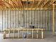 View of the interior during construction, featuring concrete block walls and exposed lumber at 1402 Stetson St, Orlando, FL 32804