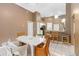 Dining room with tiled floor adjacent to the kitchen at 14026 Eckard Ct, Orlando, FL 32826