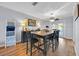 Stylish dining room featuring modern decor, ample natural light, and seating for six at 141 Greenfield Rd, Winter Haven, FL 33884