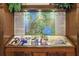 Display featuring a community map, the Declaration of Independence, and Gathering photos at 14467 Prunningwood Pl, Winter Garden, FL 34787