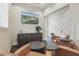 Cozy sitting area with comfortable seating, a TV, and a view to the outside at 14467 Prunningwood Pl, Winter Garden, FL 34787