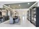 Sophisticated dining room featuring modern lighting and decor, complemented by stylish cabinets at 15343 Rising View Dr, Montverde, FL 34756