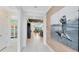 Bright hallway showcasing modern decor and an open view into a living space at 15343 Rising View Dr, Montverde, FL 34756