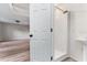 Bathroom featuring a step-in shower with white enclosure and white vessel sink and door open to room at 181 Zachary Wade St, Winter Garden, FL 34787