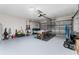 Spacious garage with a pool table and ample room for storage at 181 Zachary Wade St, Winter Garden, FL 34787