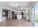 Modern kitchen featuring white cabinets, stainless steel appliances, and center island at 181 Zachary Wade St, Winter Garden, FL 34787