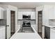 Bright, updated kitchen with stainless steel appliances and quartz countertops at 181 Zachary Wade St, Winter Garden, FL 34787