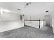 Upstairs loft area featuring carpet and neutral paint tone with black and white railing at 181 Zachary Wade St, Winter Garden, FL 34787