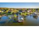 Aerial view of waterfront homes with private boat docks and lush landscaping at 181 Zachary Wade St, Winter Garden, FL 34787