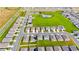 Wide aerial shot showcasing the property's location within a Primary-planned community near a community pool at 1811 Silverbell Loop, Haines City, FL 33844