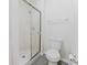 Clean white bathroom showcasing a glass-enclosed shower stall and modern toilet at 1832 Corner Meadow Cir, Orlando, FL 32820