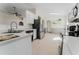 Well-lit kitchen with stainless steel appliances and plenty of countertop space at 1832 Corner Meadow Cir, Orlando, FL 32820