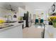 Bright kitchen with stainless steel appliances, white cabinetry, and eat-in nook at 1832 Corner Meadow Cir, Orlando, FL 32820