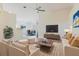 Stylish living room with modern furniture and decor, and a ceiling fan at 1832 Corner Meadow Cir, Orlando, FL 32820
