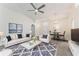 Bright living room with modern furnishings and decor, and plenty of seating at 1832 Corner Meadow Cir, Orlando, FL 32820
