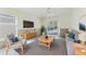 Cozy living room with modern decor, sliding glass doors and comfortable seating at 1832 Corner Meadow Cir, Orlando, FL 32820