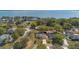 Charming single-Gathering home with a long driveway and mature trees near a lake at 2011 Oakbend Dr, Eustis, FL 32726
