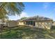 Expansive backyard features a shed, providing extra storage at 2011 Oakbend Dr, Eustis, FL 32726