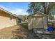 Property features a backyard shed, perfect for outdoor storage at 2011 Oakbend Dr, Eustis, FL 32726