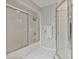 Bathroom with a tub/shower with glass door and a separate shower with glass door at 2011 Oakbend Dr, Eustis, FL 32726