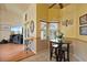 Bright breakfast nook with a small table, seating, and views of the living room at 2011 Oakbend Dr, Eustis, FL 32726