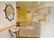 Bright kitchen with a breakfast bar, neutral paint, and white tile flooring at 2011 Oakbend Dr, Eustis, FL 32726
