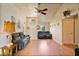 Comfortable living room with vaulted ceilings, wood floors, and neutral paint at 2011 Oakbend Dr, Eustis, FL 32726
