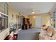 Cozy sunroom with lots of natural light, sliding glass doors and ceiling fan at 2011 Oakbend Dr, Eustis, FL 32726