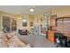Bright sunroom with wood desk and chair set, providing a comfortable workspace at 2011 Oakbend Dr, Eustis, FL 32726