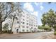 Attractive multi-story condo building with white and gray facade near a well-maintained street at 202 E South St # 5046, Orlando, FL 32801