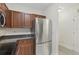Modern kitchen featuring stainless steel refrigerator and ample cabinet space at 202 E South St # 5046, Orlando, FL 32801