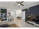 Open concept living room with hardwood flooring, recessed lighting, decorative shelving, and a modern color palette at 202 E South St # 5046, Orlando, FL 32801