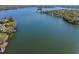 Expansive aerial view of the lake showcasing the community's waterfront location at 204 Quayside Cir # 501, Maitland, FL 32751