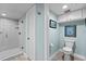 Clean bathroom featuring a walk-in shower, tile flooring, and neutral paint at 204 Quayside Cir # 501, Maitland, FL 32751