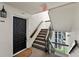 Well-maintained hallway with stairs leading to the condo unit at 204 Quayside Cir # 501, Maitland, FL 32751