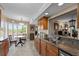 Spacious kitchen with granite counters, stainless sink, breakfast nook with bay window and lots of natural light at 204 Quayside Cir # 501, Maitland, FL 32751