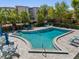 Relaxing community pool area with lounge chairs and meticulously maintained landscaping at 204 Quayside Cir # 501, Maitland, FL 32751