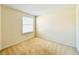 Bright bedroom featuring neutral walls, carpet, and a window with blinds at 2144 Rookery Ln, Sanford, FL 32773