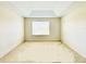 Sunlit bedroom with neutral carpet and tray ceiling, offering a blank canvas for personalization and relaxation at 2144 Rookery Ln, Sanford, FL 32773