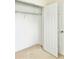 Interior view of closet with wire shelving and standard six-panel door at 2144 Rookery Ln, Sanford, FL 32773