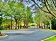 View of the community entrance with brick columns and secure gate at 2144 Rookery Ln, Sanford, FL 32773