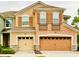 Charming home with a two-car garage and well-maintained landscaping at 2144 Rookery Ln, Sanford, FL 32773