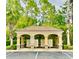Community mailboxes with a covered structure surrounded by palm trees at 2144 Rookery Ln, Sanford, FL 32773